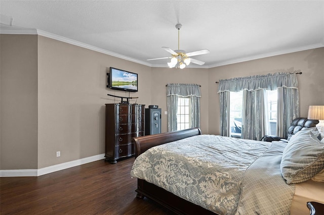 3033 Zaharias Dr, Orlando, FL 32837 - bedroom featuring dark wood-type flooring, ornamental molding, baseboards, and ceiling fan