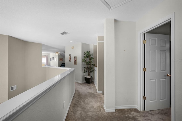 3033 Zaharias Dr, Orlando, FL 32837 - corridor featuring visible vents, baseboards, an upstairs landing, and carpet flooring