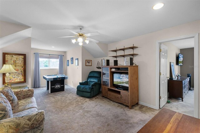 3033 Zaharias Dr, Orlando, FL 32837 - living area with baseboards, a ceiling fan, and light colored carpet