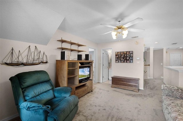 3033 Zaharias Dr, Orlando, FL 32837 - living area with light carpet, ceiling fan, and baseboards