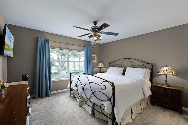 3033 Zaharias Dr, Orlando, FL 32837 - bedroom with ceiling fan, carpet flooring, and baseboards