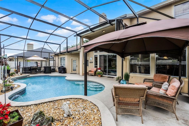 3033 Zaharias Dr, Orlando, FL 32837 - pool featuring an outdoor hangout area, glass enclosure, a patio area, fence, and a gazebo