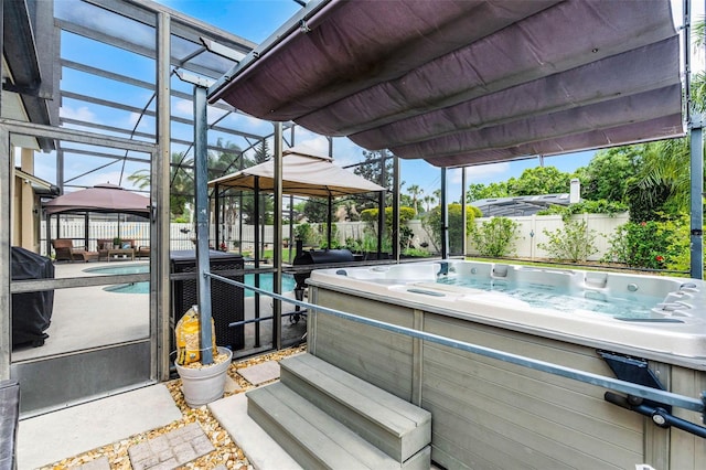 3033 Zaharias Dr, Orlando, FL 32837 - view of dock with a fenced backyard, a gazebo, glass enclosure, and an outdoor hot tub