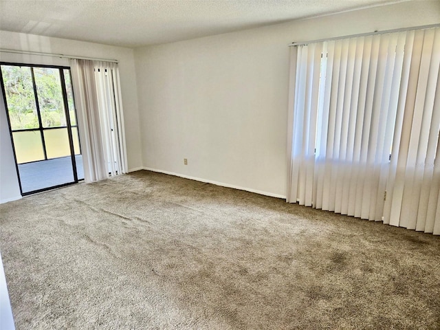 5 Buck Cir # B5, Haines City, FL 33844 - spare room featuring baseboards and carpet