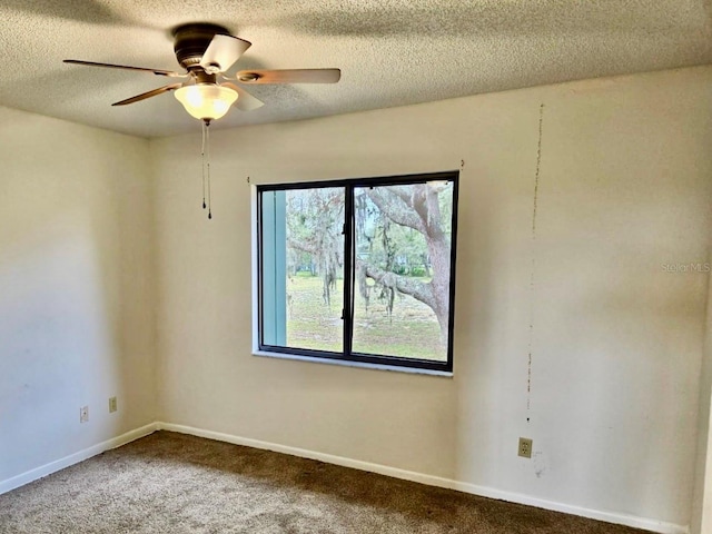 5 Buck Cir # B5, Haines City, FL 33844 - carpeted empty room with a ceiling fan, baseboards, and a textured ceiling