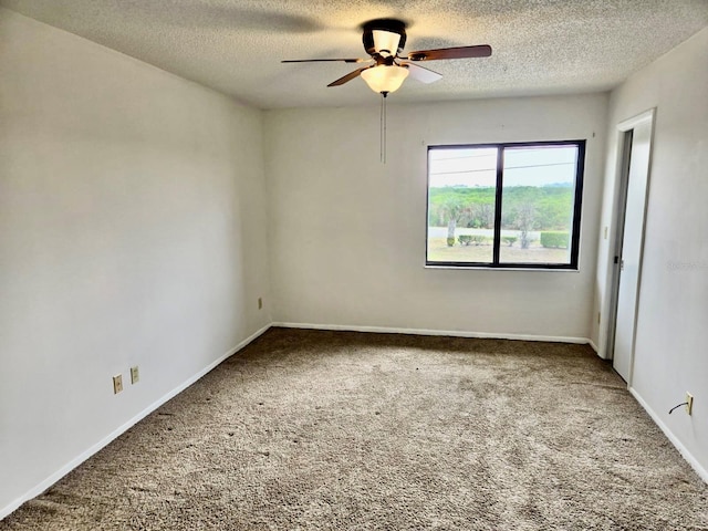 5 Buck Cir # B5, Haines City, FL 33844 - carpeted spare room featuring a textured ceiling, baseboards, and a ceiling fan