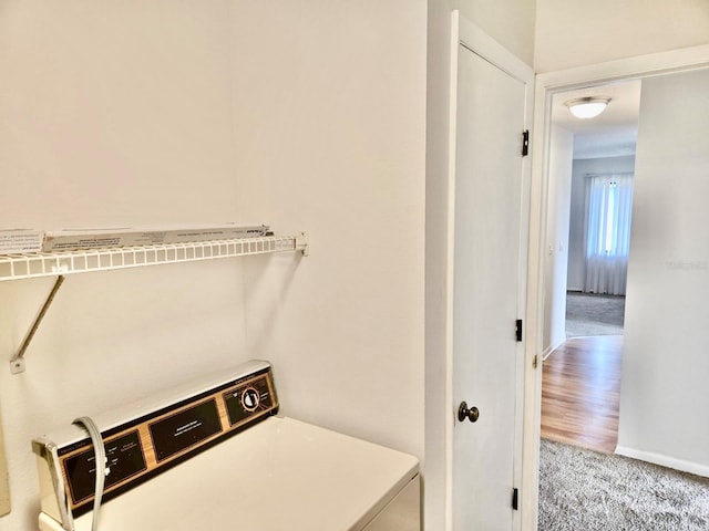 5 Buck Cir # B5, Haines City, FL 33844 - laundry area with baseboards, washer / clothes dryer, laundry area, and carpet