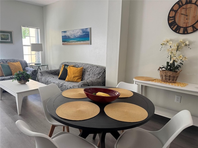 1119 Park Ridge Cir, Kissimmee, FL 34746 - dining space with wood finished floors