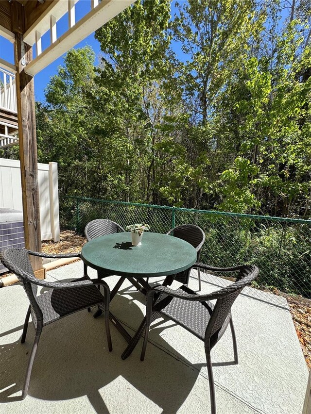 1119 Park Ridge Cir, Kissimmee, FL 34746 - view of patio with outdoor dining area