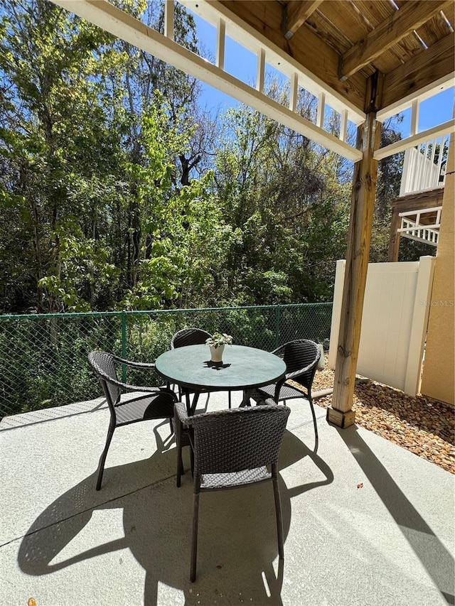 1119 Park Ridge Cir, Kissimmee, FL 34746 - view of patio featuring fence