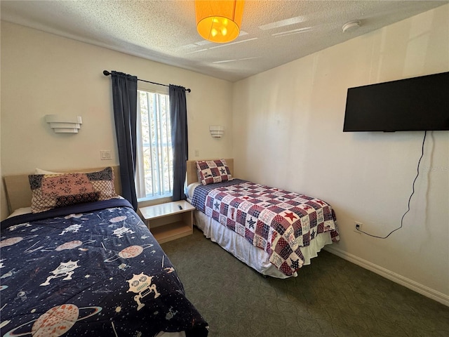 1119 Park Ridge Cir, Kissimmee, FL 34746 - bedroom featuring baseboards, carpet flooring, and a textured ceiling