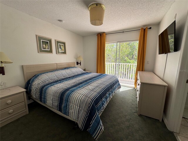 1119 Park Ridge Cir, Kissimmee, FL 34746 - bedroom with access to outside, a textured ceiling, and dark carpet