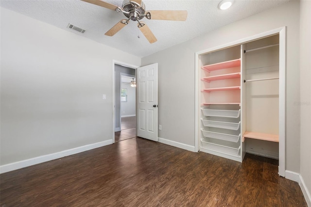 725 Laurel Way, Casselberry, FL 32707 - unfurnished bedroom featuring wood finished floors, a textured ceiling, ceiling fan, and a closet