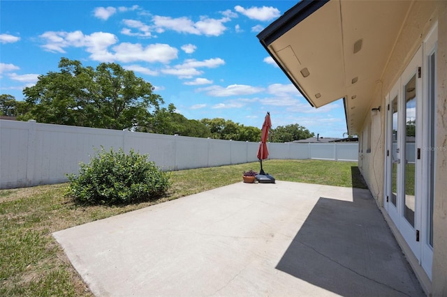 725 Laurel Way, Casselberry, FL 32707 - fenced backyard with a patio area and french doors