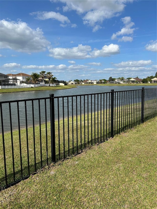 5406 Crepe Myrtle Cir, Kissimmee, FL 34758 - view of water feature with a fenced backyard