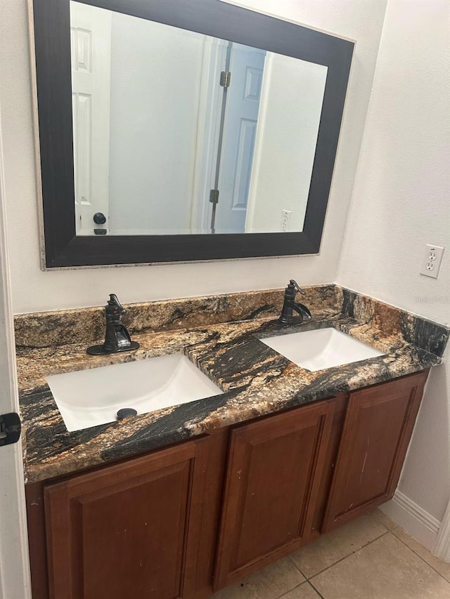 5406 Crepe Myrtle Cir, Kissimmee, FL 34758 - full bathroom featuring double vanity, a sink, and tile patterned floors