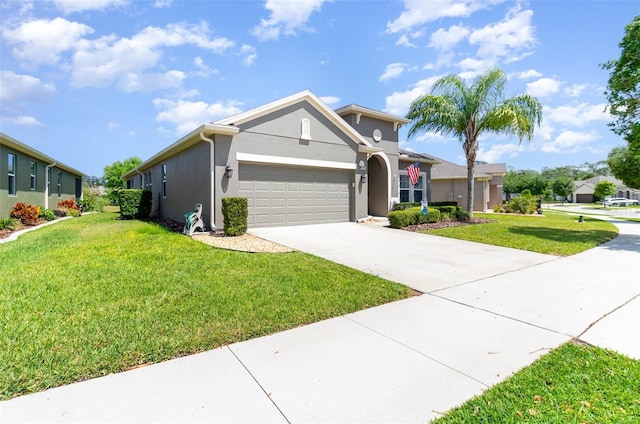 single story home with stucco siding, concrete driveway, a front yard, and a garage