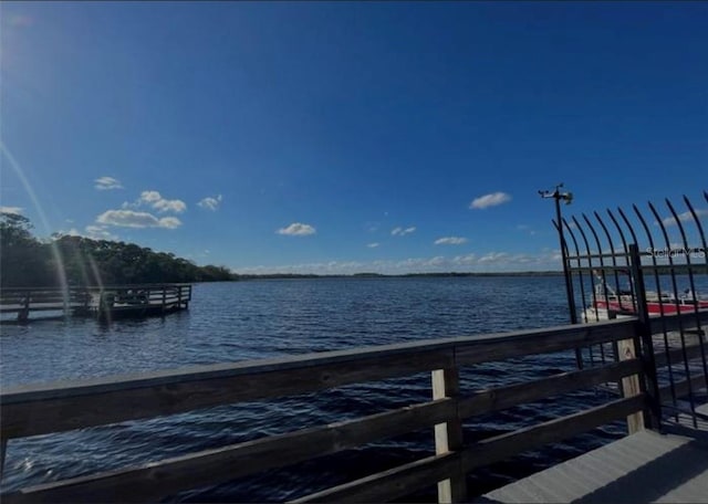 dock area featuring a water view