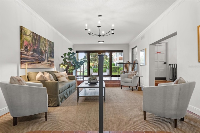 living area with a chandelier, baseboards, visible vents, and crown molding