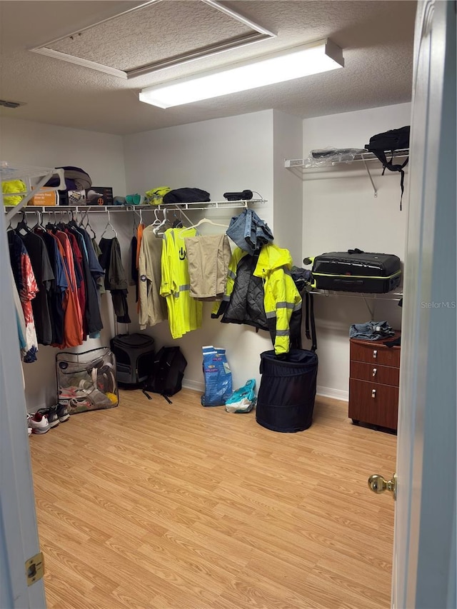 422 Janice Kay Pl, Kissimmee, FL 34744 - spacious closet featuring wood finished floors and visible vents