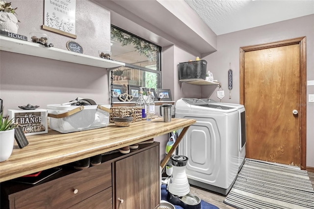 2475 Cox Rd, Cocoa, FL 32926 - washroom featuring wood finished floors, washer and clothes dryer, and laundry area