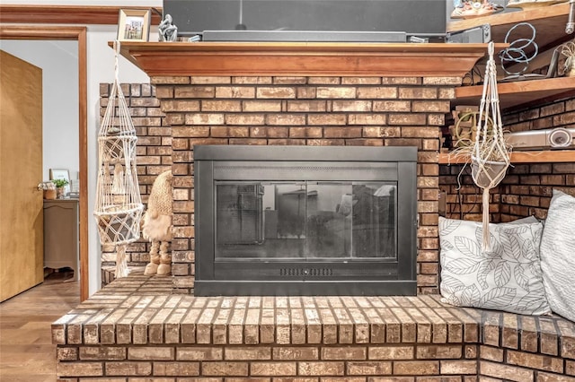 2475 Cox Rd, Cocoa, FL 32926 - interior details with a fireplace and wood finished floors