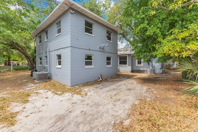 back of property with central air condition unit