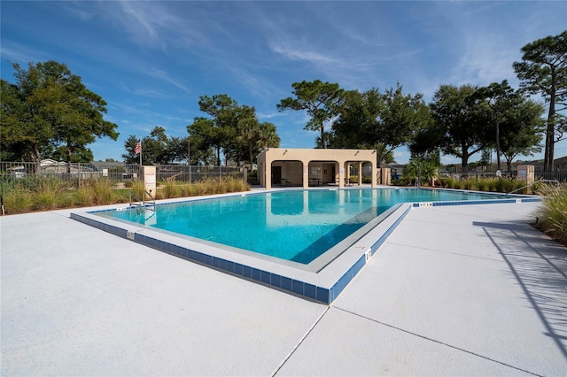 221 Indian Point Cir, Kissimmee, FL 34746 - pool featuring a patio and fence