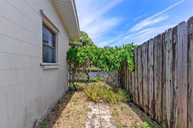 view of yard featuring fence