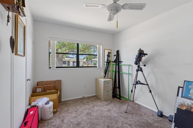 game room with baseboards, a ceiling fan, and carpet flooring