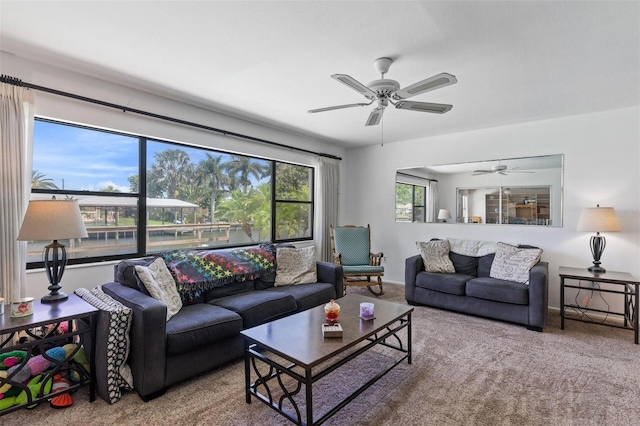 living room with carpet flooring and ceiling fan