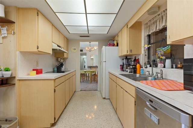 kitchen featuring a sink, light countertops, freestanding refrigerator, stainless steel dishwasher, and under cabinet range hood