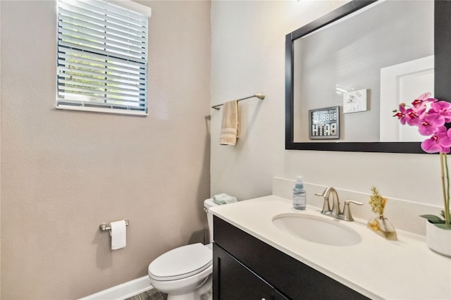 11150 Whistling Pine Way, Orlando, FL 32832 - half bathroom with baseboards, toilet, and vanity