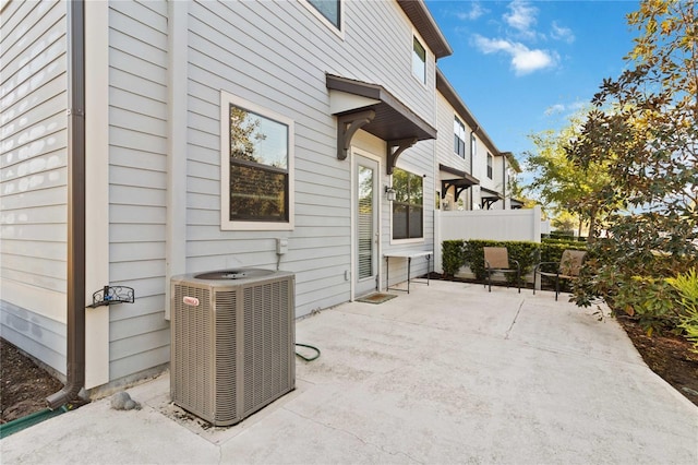 11150 Whistling Pine Way, Orlando, FL 32832 - view of patio / terrace featuring fence and cooling unit