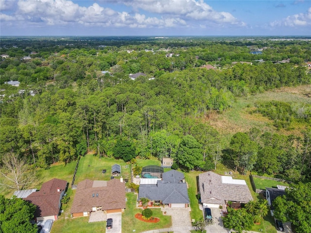 1007 Gammage Pt, Oviedo, FL 32765 - aerial view of property and surrounding area with a heavily wooded area