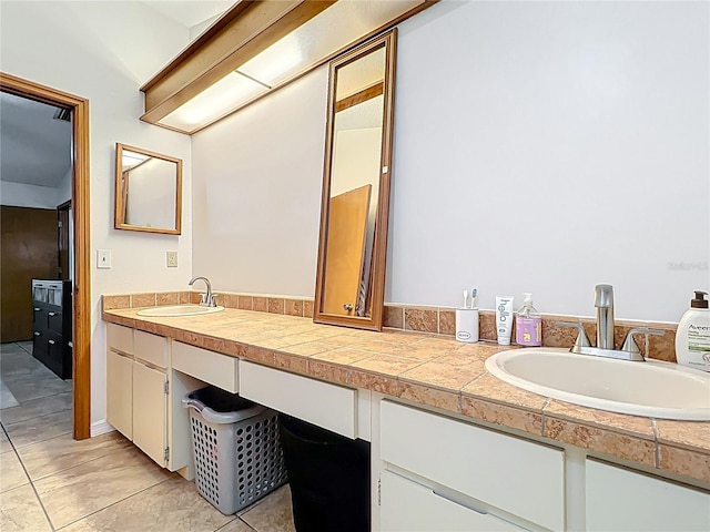 1007 Gammage Pt, Oviedo, FL 32765 - bathroom featuring double vanity and tile patterned floors