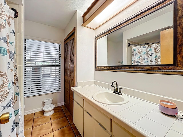 1007 Gammage Pt, Oviedo, FL 32765 - bathroom with vanity, tile patterned floors, and a shower with shower curtain