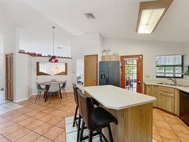 1007 Gammage Pt, Oviedo, FL 32765 - kitchen with refrigerator with ice dispenser, light tile patterned flooring, a sink, light countertops, and high vaulted ceiling