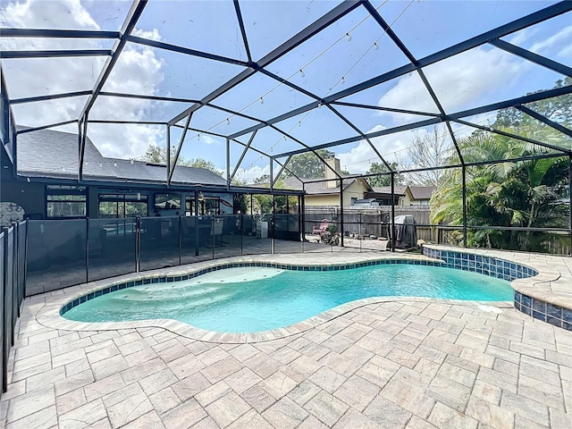 1007 Gammage Pt, Oviedo, FL 32765 - swimming pool featuring a patio and glass enclosure
