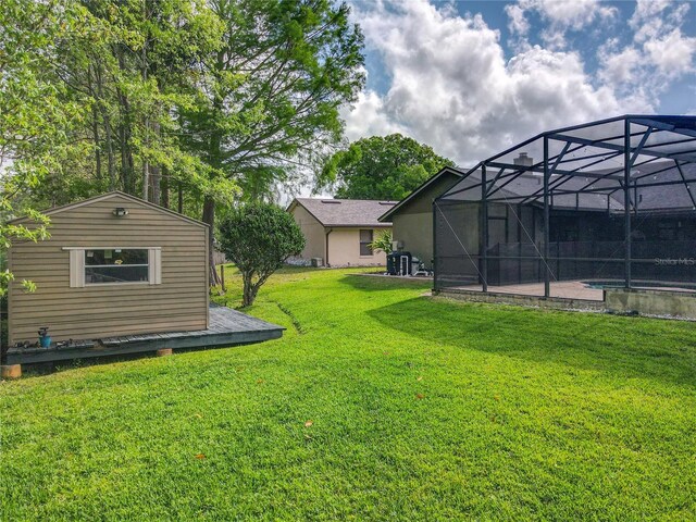 1007 Gammage Pt, Oviedo, FL 32765 - view of green lawn featuring an outdoor pool