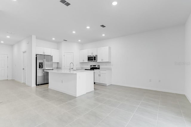 172 River Front Way, Edgewater, FL 32141 - kitchen with light countertops, stainless steel appliances, recessed lighting, and visible vents