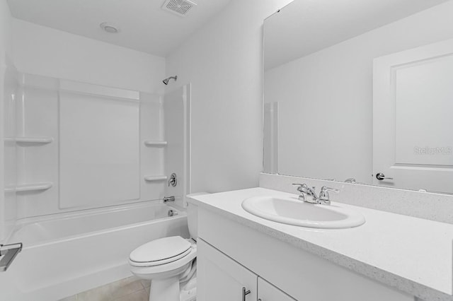 172 River Front Way, Edgewater, FL 32141 - full bathroom with visible vents, vanity, toilet, bathtub / shower combination, and tile patterned floors