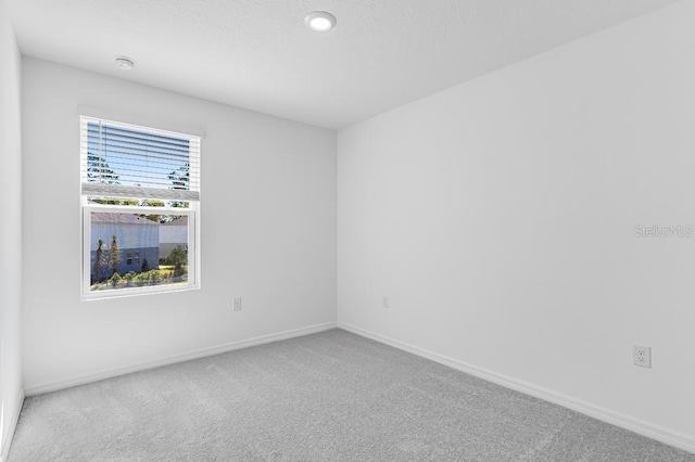 172 River Front Way, Edgewater, FL 32141 - unfurnished room featuring baseboards, carpet flooring, and recessed lighting