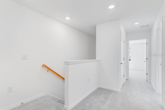 172 River Front Way, Edgewater, FL 32141 - corridor featuring carpet floors, recessed lighting, baseboards, an upstairs landing, and visible vents