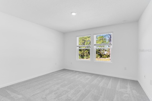 172 River Front Way, Edgewater, FL 32141 - unfurnished room featuring baseboards and light carpet