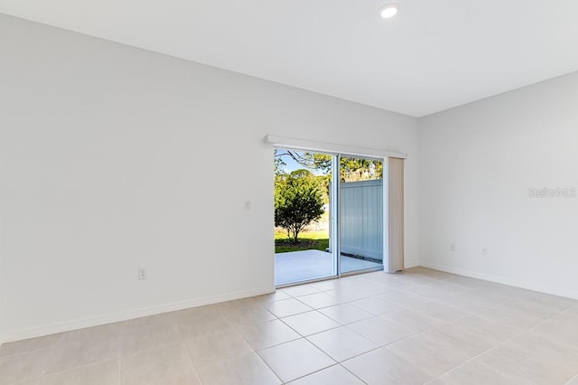 172 River Front Way, Edgewater, FL 32141 - empty room with recessed lighting, baseboards, and light tile patterned floors