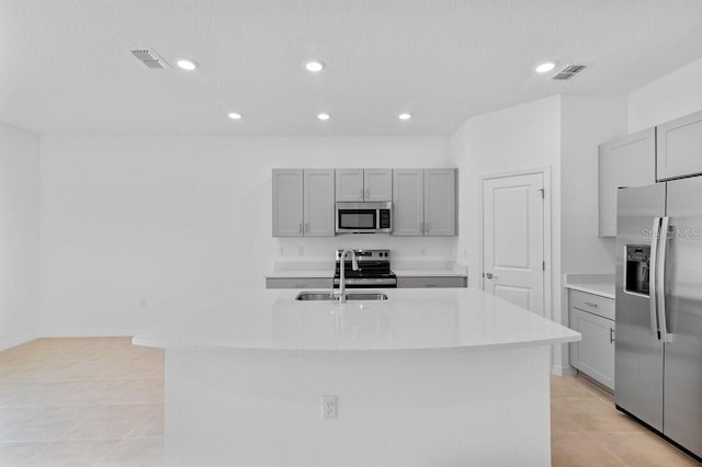 174 River Front Way, Edgewater, FL 32141 - kitchen featuring a sink, gray cabinets, and stainless steel appliances