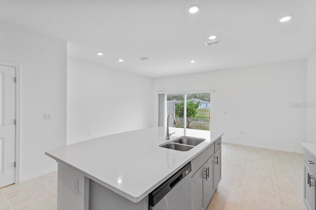 174 River Front Way, Edgewater, FL 32141 - kitchen with visible vents, a center island with sink, dishwasher, a sink, and light countertops