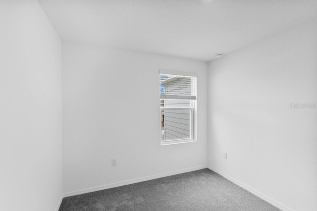 174 River Front Way, Edgewater, FL 32141 - carpeted empty room with baseboards