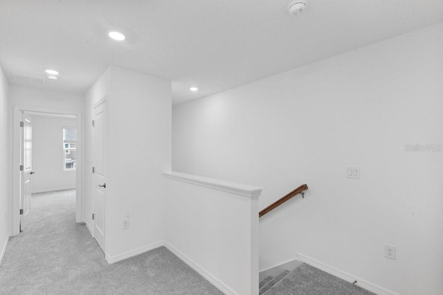 174 River Front Way, Edgewater, FL 32141 - hallway with carpet floors, recessed lighting, and an upstairs landing